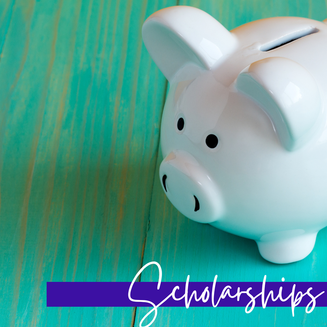 white piggy bank on a blue wooden background. Banner across image has the word Scholarships.